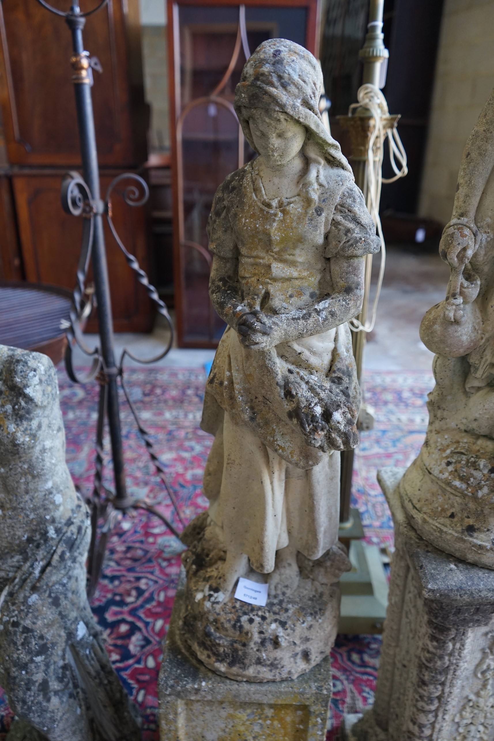 Four reconstituted stone garden statues, largest height 124cm